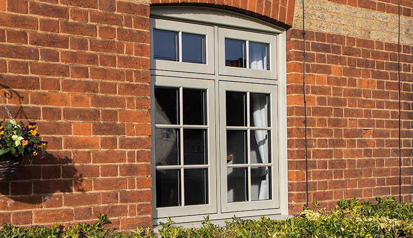 Brown uPVC flush sash window installation